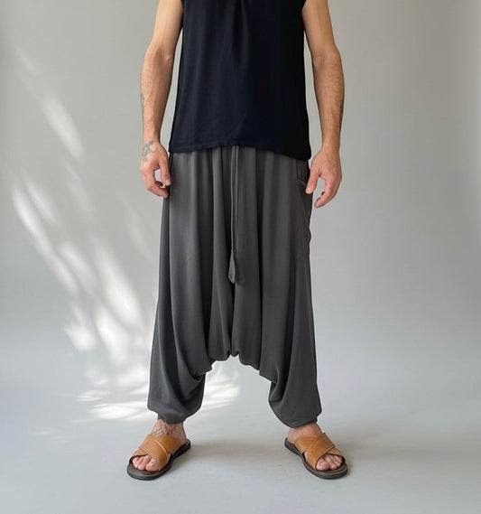 Goa Nomads charcoal grey cotton blend relaxed fit harem pants with drawstring waist and side pocket.
