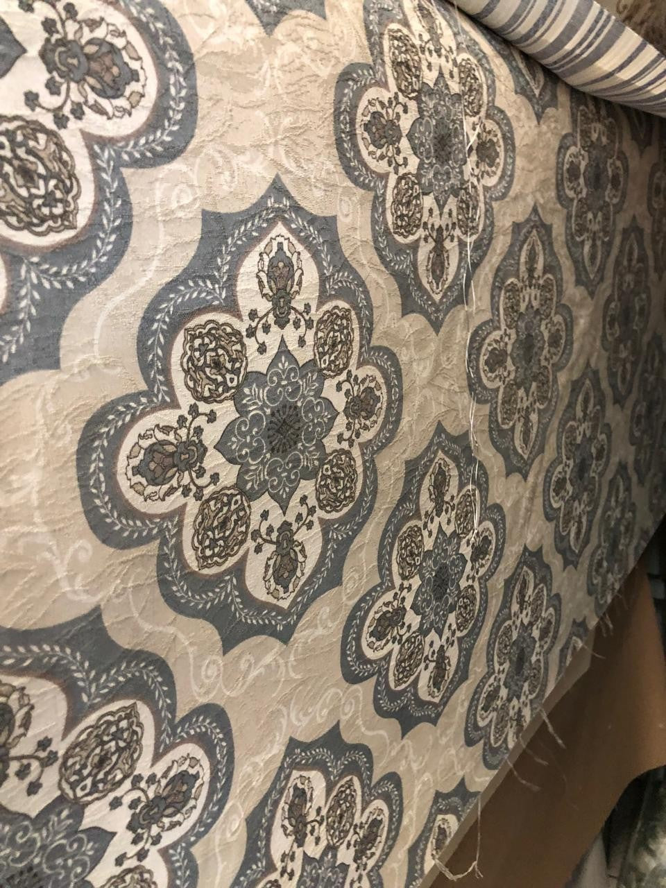 Goa Nomads beige and grey patterned fabric with intricate floral motifs, suitable for custom trousers.