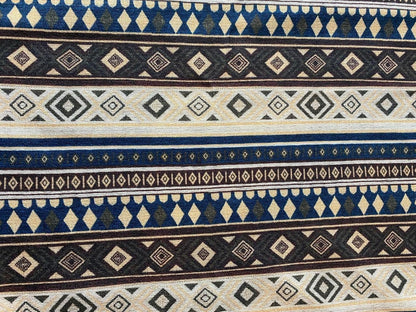 Goa Nomads Calça Hindu Ganesha pants with tribal geometric patterns in blue, beige, brown, and black.