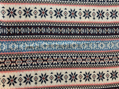 Goa Nomads Calça Hindu Ganesha pants with a tribal geometric pattern in cream, navy, rust, and light blue.