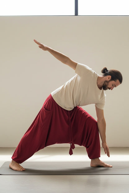 Goa Nomads men's wine red cotton yoga pants with drawstring waist and side pocket, perfect for movement.